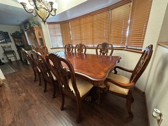 Large dining table with 8 chairs