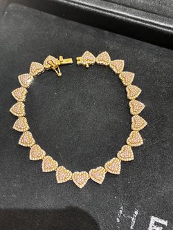 14 k Heart bracelet with stones