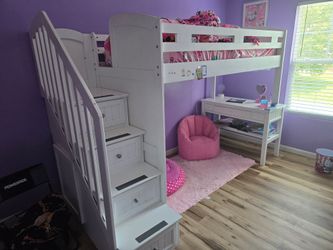 Girl top bunk bed with desk