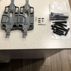 TRAXXAS EREVO/SLASH /SUMMIT 1/16 SCALE CHASSIS’S (2) AND STOCK PARTS BUNDLE (USED IN EXCELLENT SHAPE)