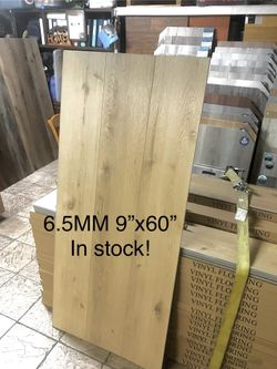 6.5MM 100% WATERPROOF SPC RIGID CORE LUXURY VINYL PLANK LONG 60”PLANK FLOORING WITH PAD ATTACHED. GREAT FOR HOME,OFFICE AND RENTALS