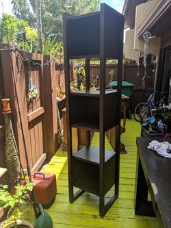 Tall cabinet with 6 shelves and 3 box compartment