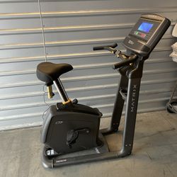 Like new Matrix Upright exercise bike with Blue LCD Console