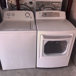 White Amana Washer And LG Electric Dryer