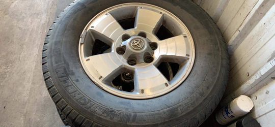Off of a 98 Toyota Tacoma! Wheels and tires. 2 great and 2 needs replacing