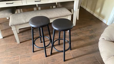 Two black stools