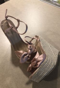 Brand new wedges with a satin bow