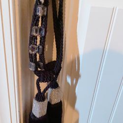 Two Black Certain Hold Backs 