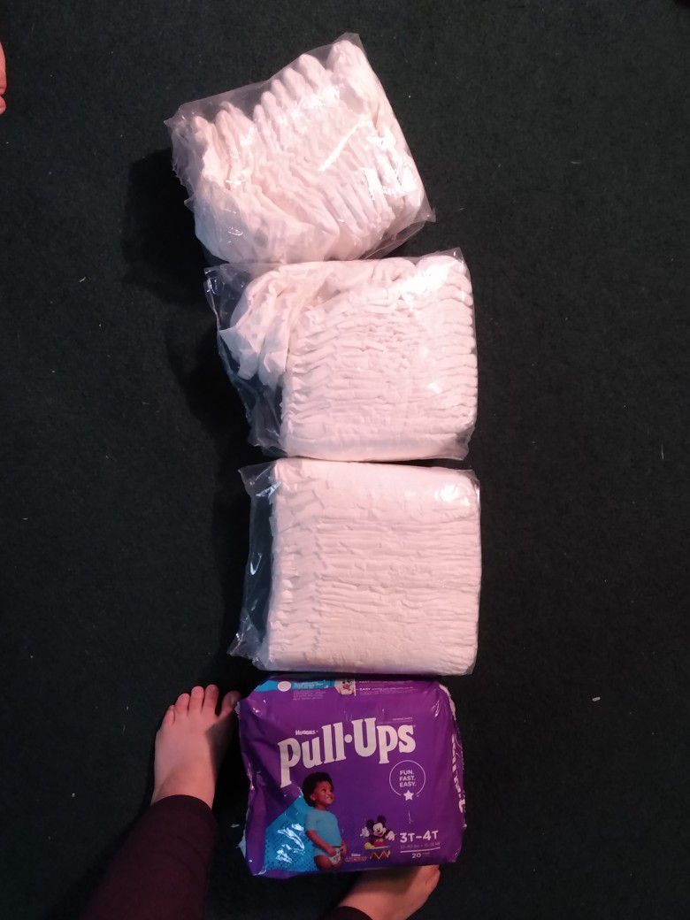 Size 5 Diapers And 3t-4t Pill Ups 