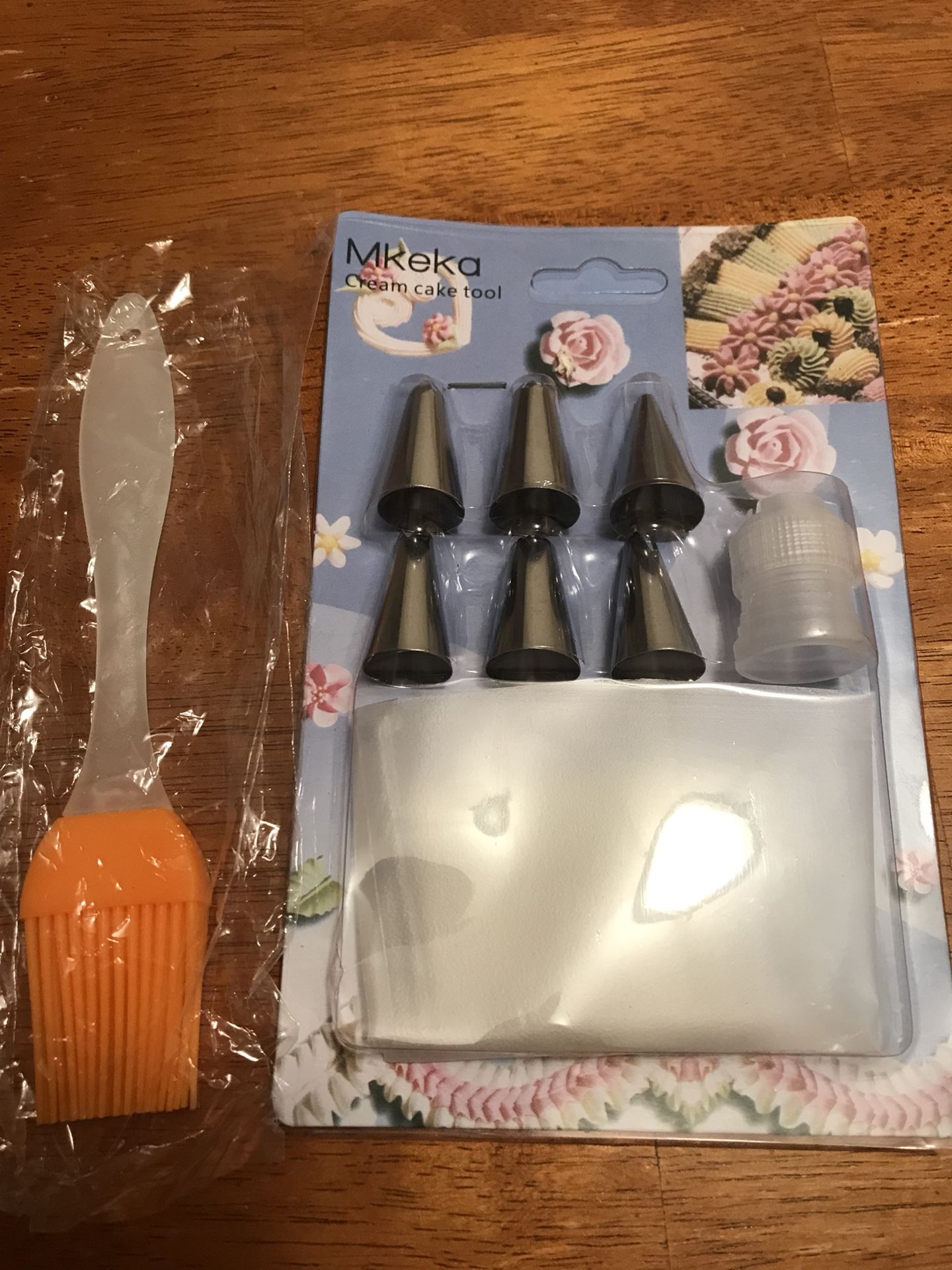 Cake decor tips, bag and brush