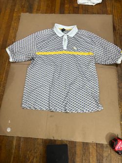 Vintage Sean John polo shirt is size 3XL. This 100% cotton garment has a white, grey, and yellow geometric pattern with a solid yellow horizontal stri