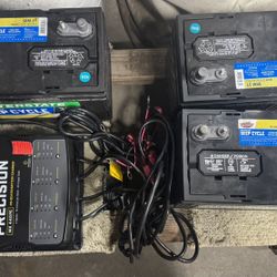 3 Interstate Marine Deep Cycle SRM-31 Batteries And MinnKota Precision MK 440 PC 4bank Charger (bundle)
