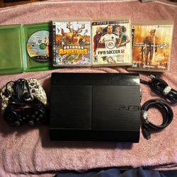 Sony PlayStation 3 Super Slim console with 250 GB of storage, two controllers, and four games: Grand Theft Auto V (disc only), Cabela's Outdoor Advent