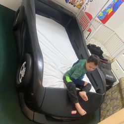 🚘🚘$$240-(firm price) gently used Twin size play car bed (gently used) FRAME ONLY MATTRESS /bed sheet NOT INCLUDED!!! Colorful wood frame (has car de