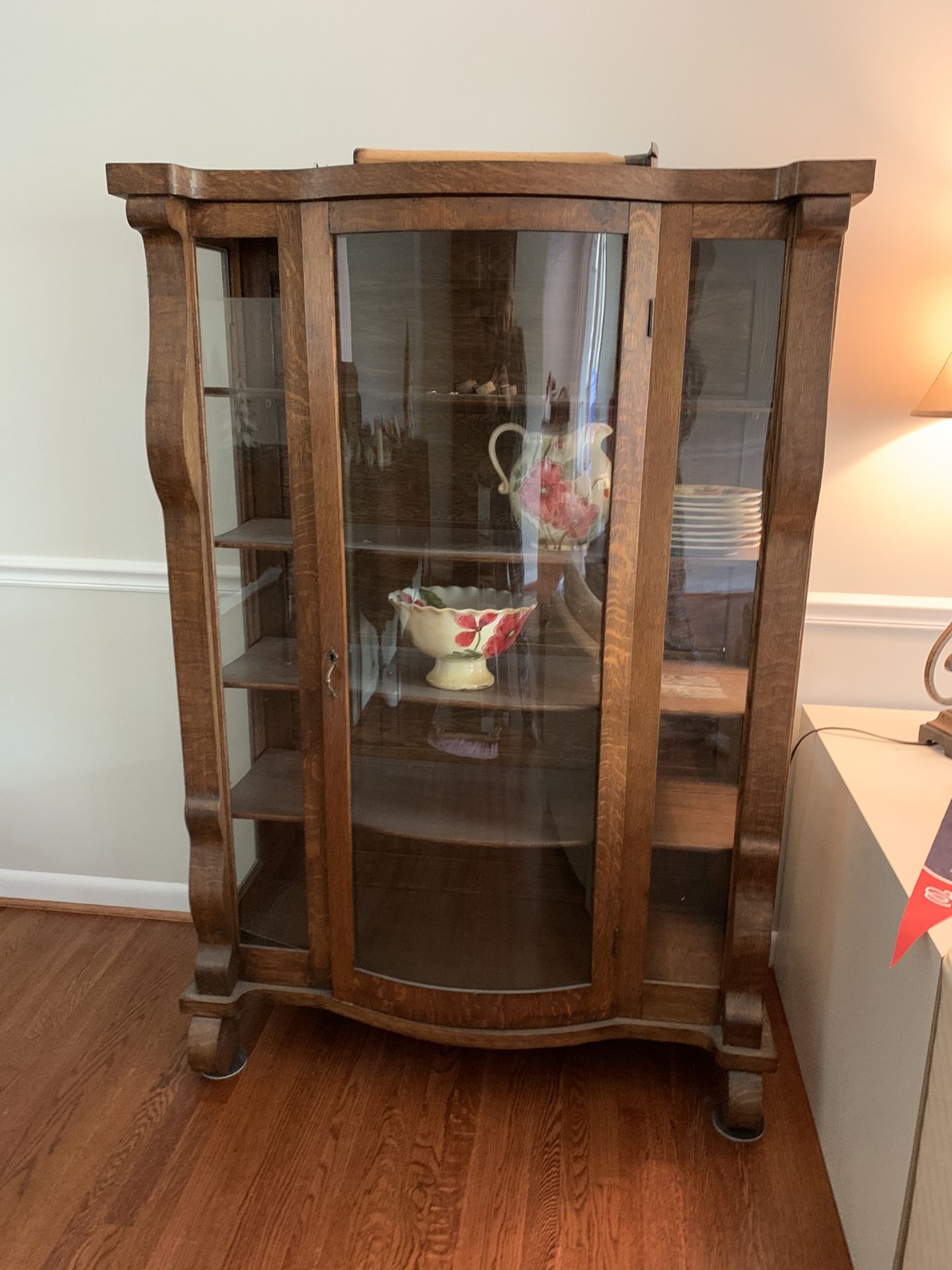 Antique bow front china cabinet