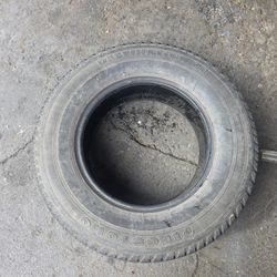 1 use tire 215/70r15 Firestone 97% good
