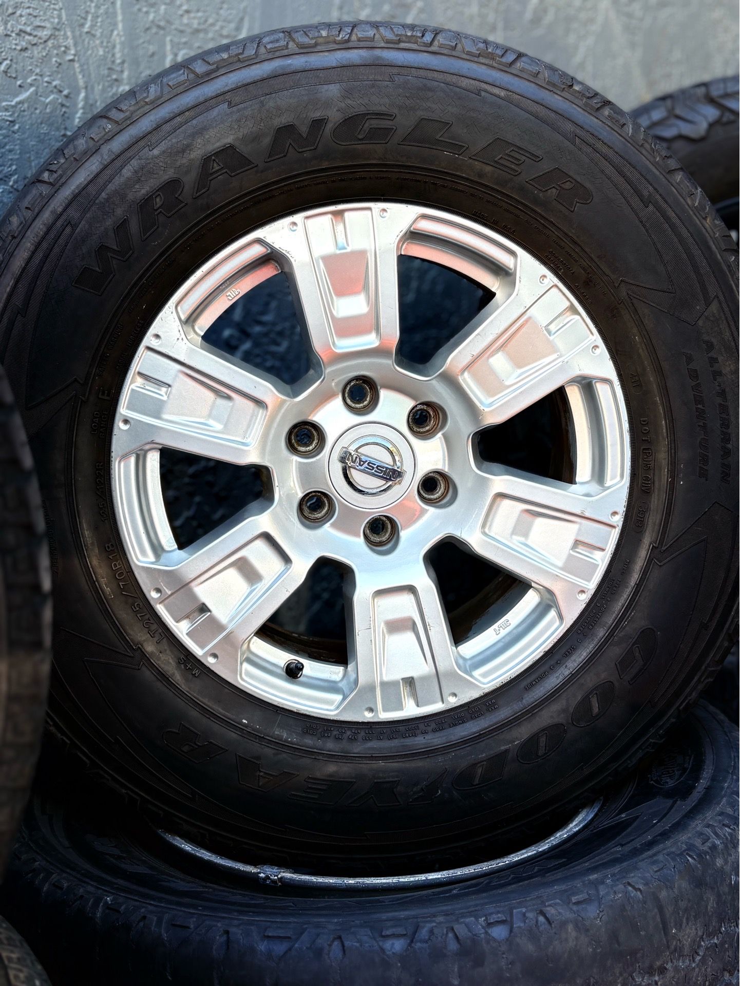 Goodyear Wrangler All-Terrain Adventure LT275/70R18 tire Nissan wheel