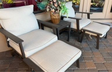 Patio Lounge Set: 2 Motion Chairs, 2 Ottomans, and Side Table with Cushions