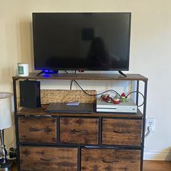 Smart Tv And Tv stand 