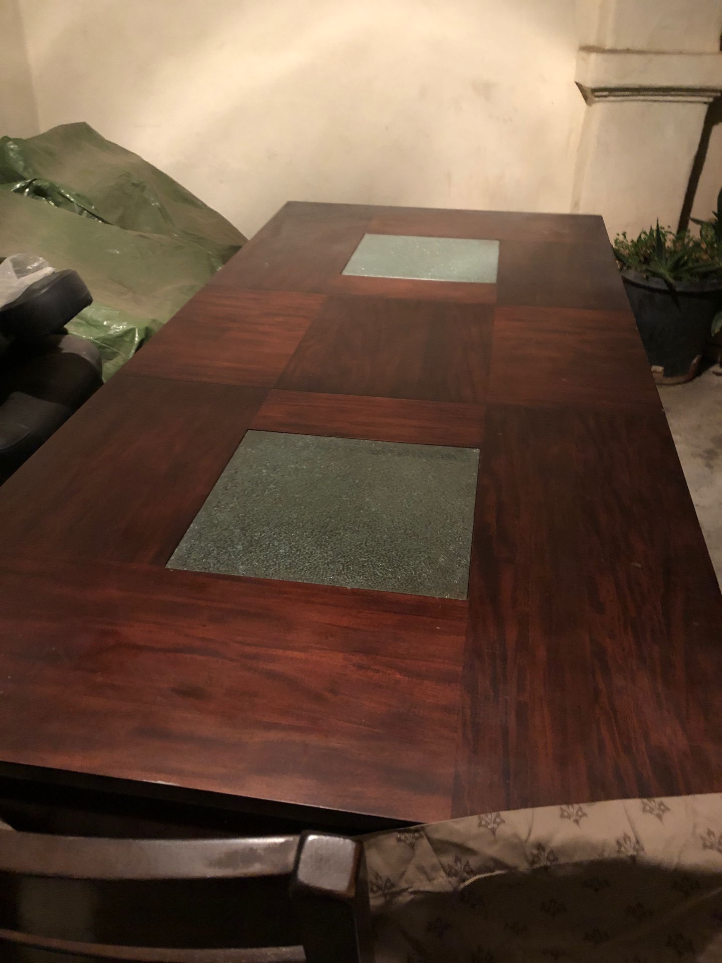 Maple wood dining room table and six chairs two glass in middle