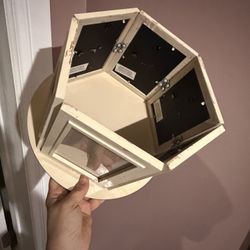 Cake Stand Photo rotating tabletop picture frame display, likely used for showing multiple photos at once., $25