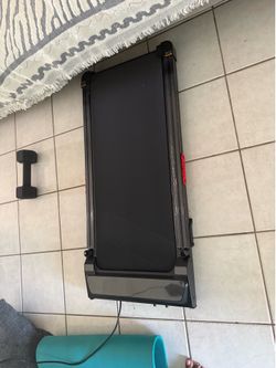 Walking pad with handle