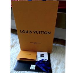 Louis Vuitton shopping bag with receipt, ribbon and receipt holder