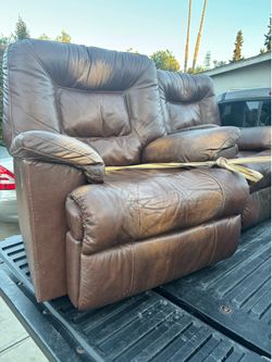Two brown recliners