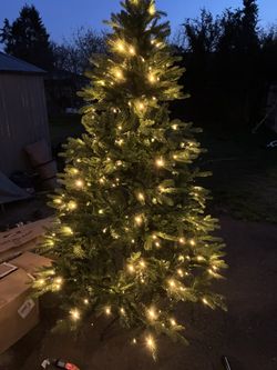 pre-lit artificial Christmas tree with warm white LED lights.