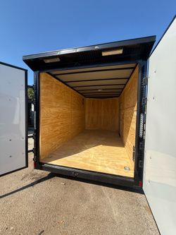 Trailer enclosed 7 x 14 extra high with spoil it door, no ramp