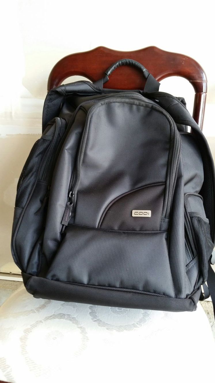 Codi laptop backpack, never used. Brand new
