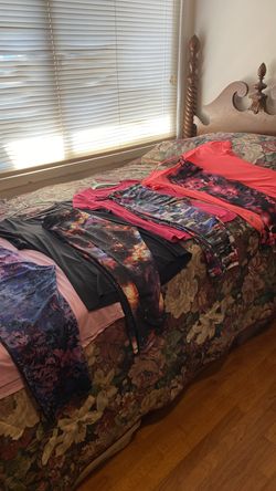 New gym outfits. Stretch capris and matching tops. Medium size. More available. Five dollars each.