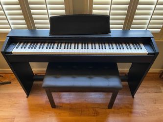 Like New Casio Electric Piano - Black - With Storage bench
