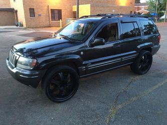 2004 Limited Edition Jeep Grand Cherokee w/22 inch Black Rims