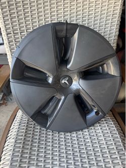 ( 4) Tesla hubcap 19 inch
