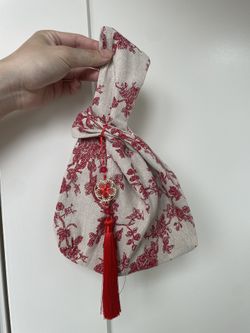 Patterned Pouch With Ornament