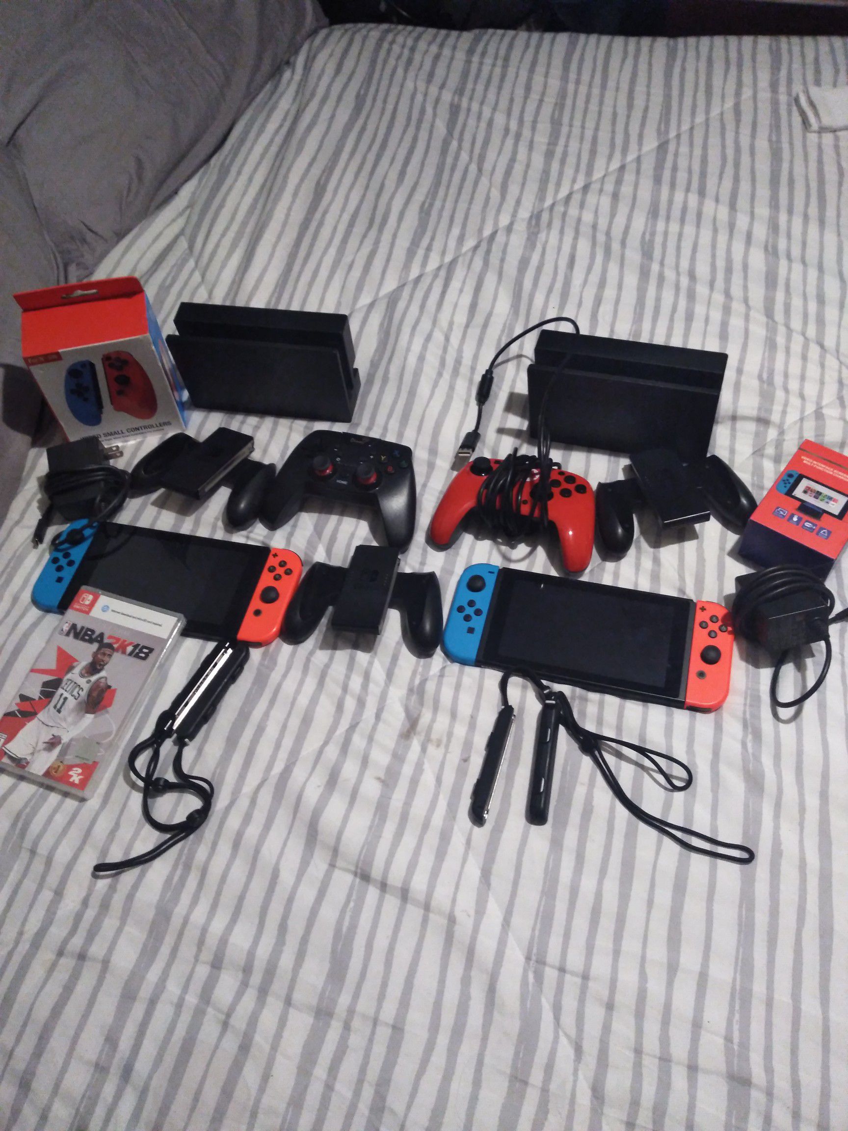 Yes 2 nintendo switches with all the baby that's include in the picture all in perfect condition 2 months old.( Pick up only)