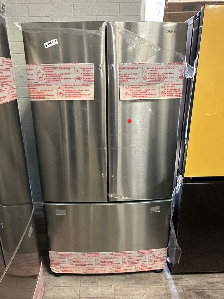 Samsung stainless steel new French door fridge with warranty has water and ice