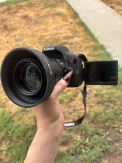 Canon EOS Rebel DSLR Camera with 18-55mm Lens
