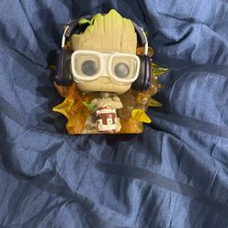 Groot with glasses and headphones and fire behind him Funko pop