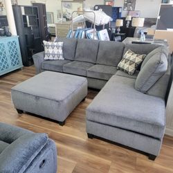 New 2pc Sectional In Grey, Ottoman Sold Separately 