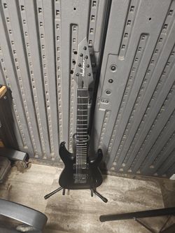 Jackson JS22 Dinky 7 string with guitar stand and Dunlop KoЯn String Pack