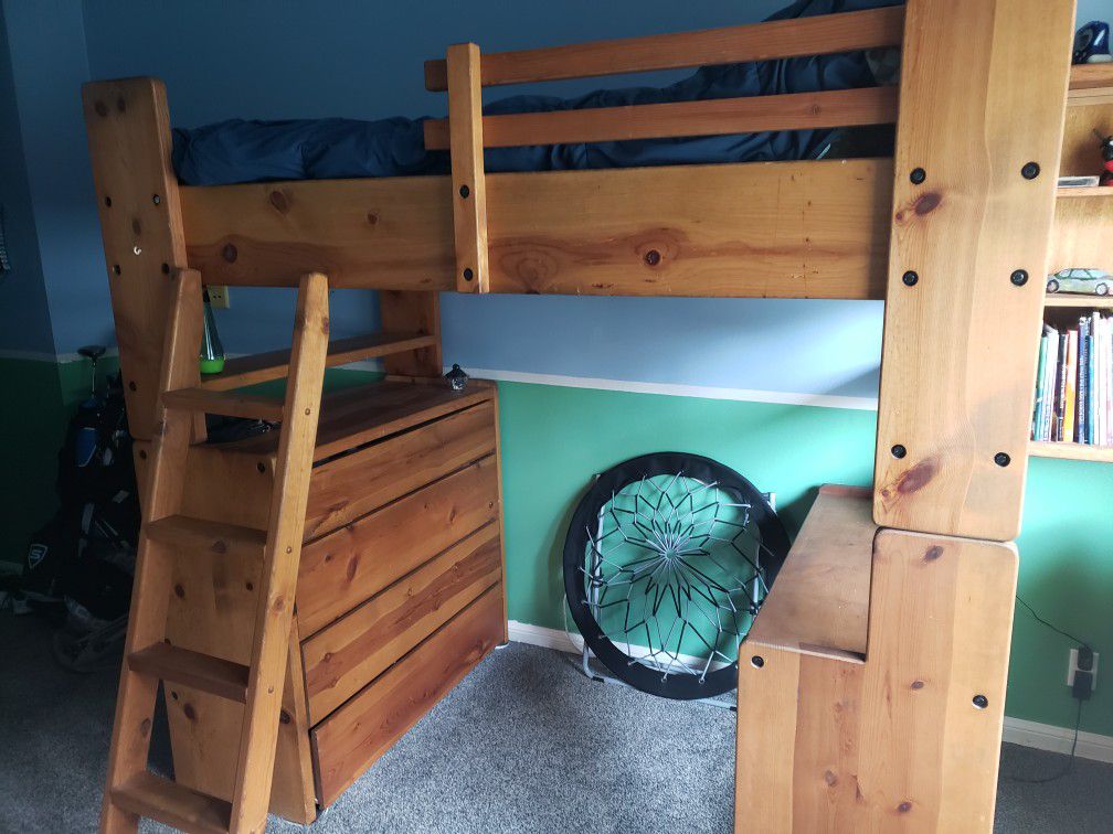 Twin loft bed w/ dresser and desk. Super sturdy. Solid wood almost 2" thick, great condition. No junk ever bought. High quality