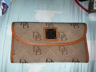 Authentic Dooney and Bourke signature monogram ￼trifold wallet