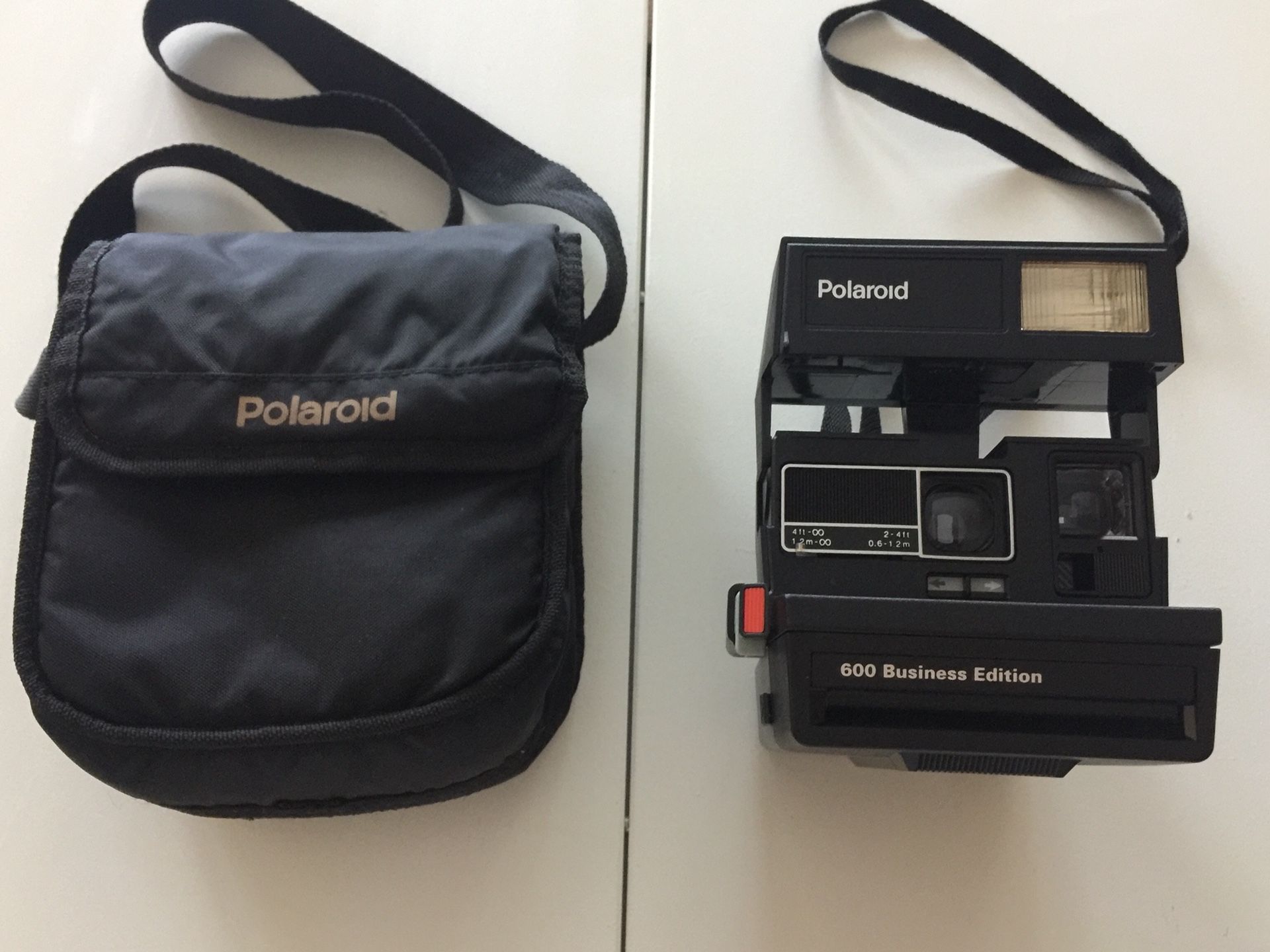 Vintage Polaroid Camera 600 Business Edition plus Carrying Case. Works. Nice condition.