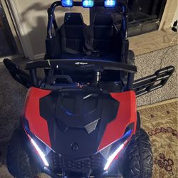 Car for children from 2 to 6 years old, red and black.