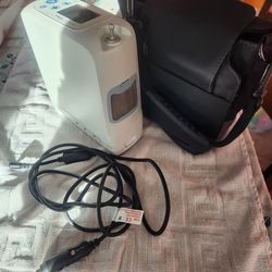 Portable oxygen machine