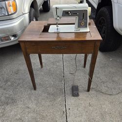 Vintage SINGER Sewing Machine In Cabinet W/original Box Of Attachments