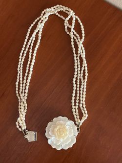 Elegant Multi-Strand Pearl Necklace with Floral Centerpiece
