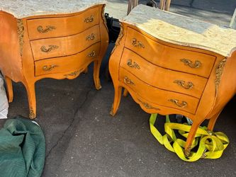 Pair of French Bombe Commodes with Marble Tops
